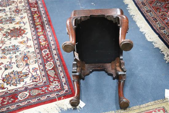 An early 18th century red walnut stool, W.1ft 6in. D.1ft 2in. H.1ft 4in.